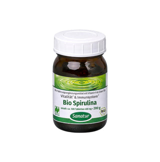 Jar of Bio Spirulina with a white cap on a white background