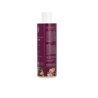 A bottle of Lavender Hair Cream with a deep purple label, white cap, and pink rose illustrations at the bottom, shown against a plain white background.
